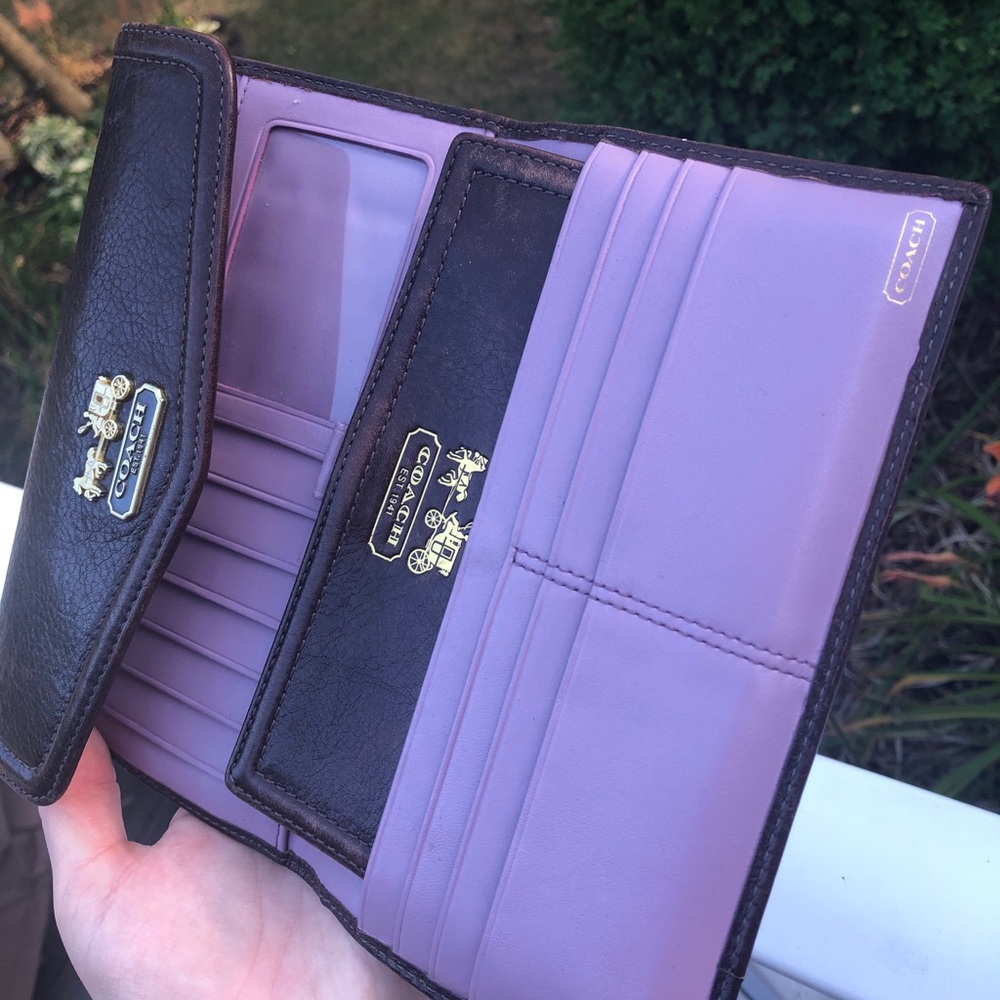 brown and light purple leather coach wallet